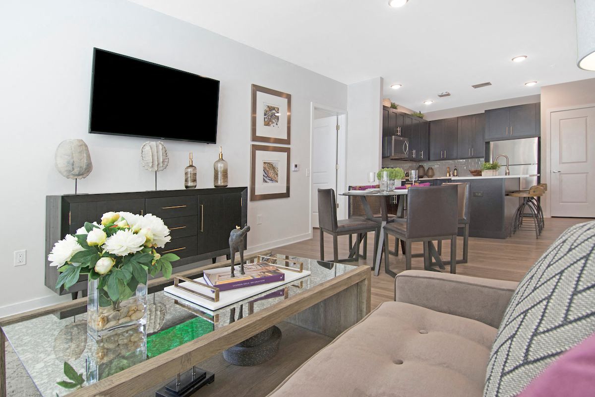 a living room with a couch and a table