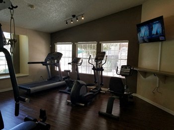 Spring Park Apartments in EL Paso TX l Fitness Center Gym with Fitness Equipment EL Paso Texas Apartments l Spring Park Rentals - Photo Gallery 4