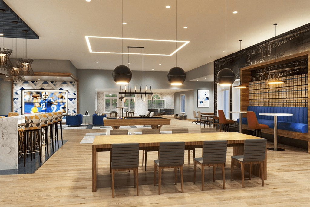 a large dining room with tables and chairs and a bar