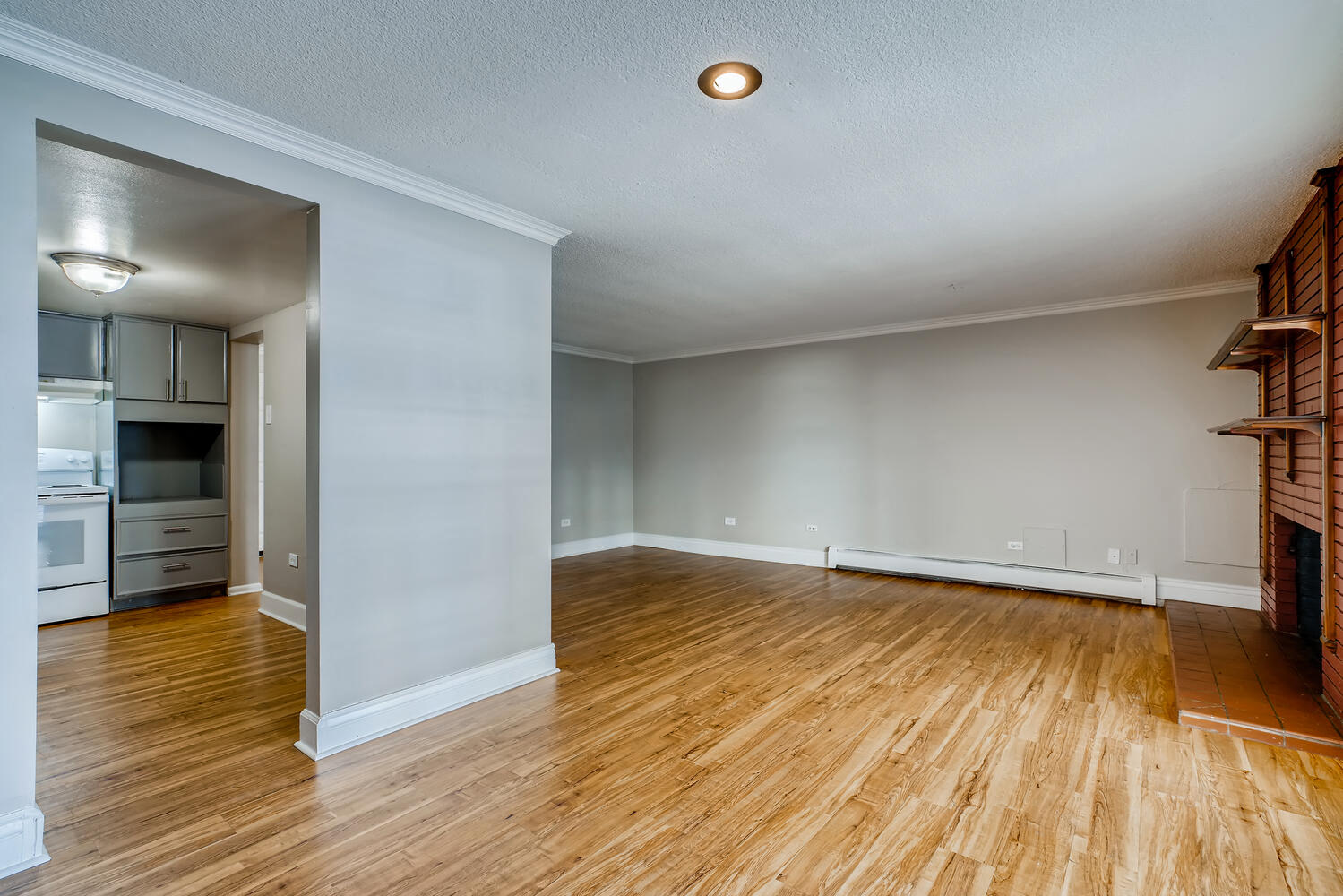 A Standard Living Room and Kitchen at Mondrian Colorado Apartments