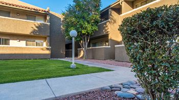 Cottonwood Creek courtyard with open grass space. 