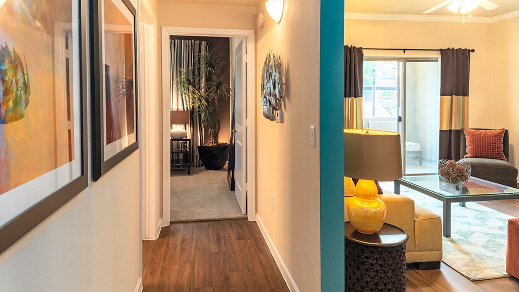 a living room with a blue accent wall