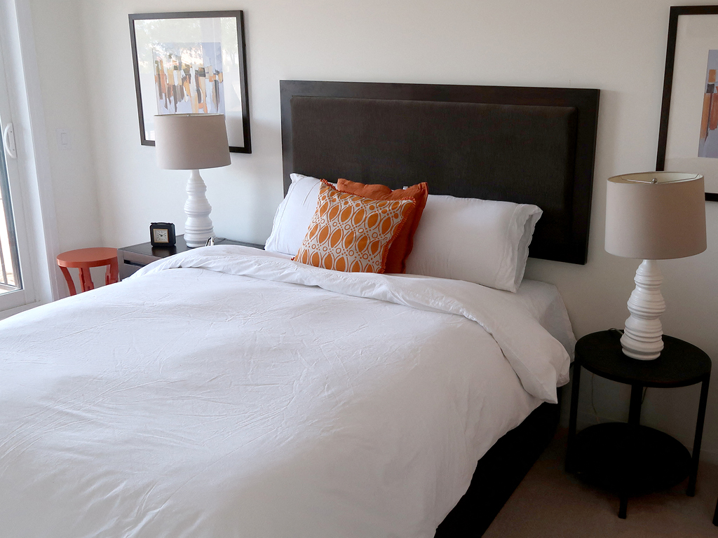 Bedroom with Two Night Tables and Wall Art