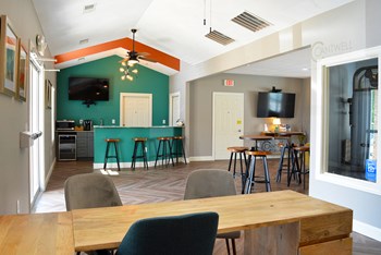 Clubhouse and leasing office with kitchen and counter top seating - Photo Gallery 8