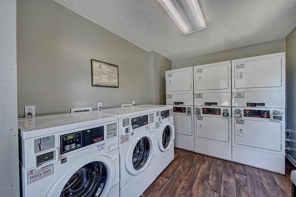 the preserve at ballantyne commons laundry room with washes and dryers