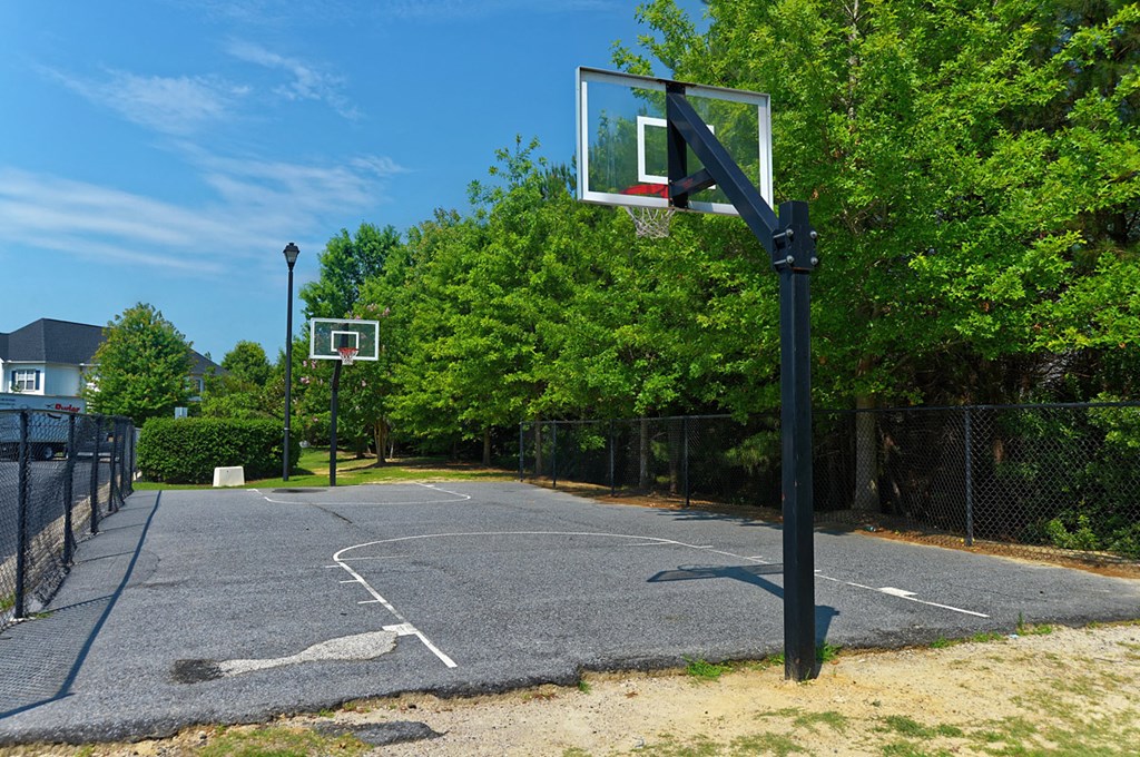 a basketball court with two basketball hoops on it