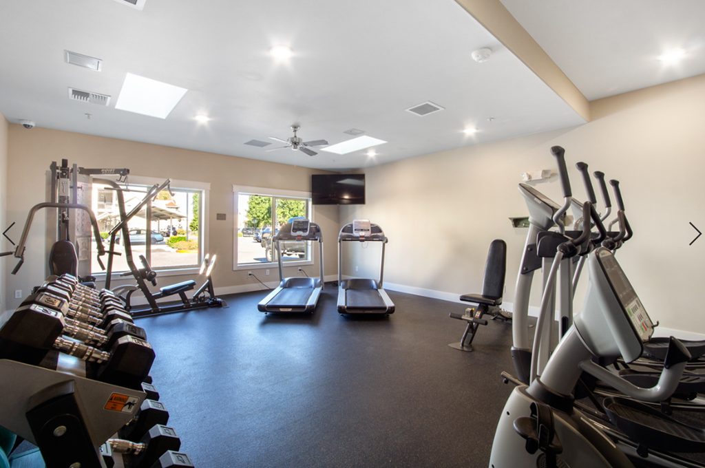 state of the art gym with cardio equipment at riverdale apartments tx