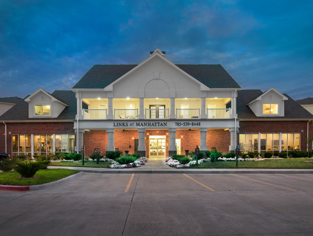 the exterior of the inns at night