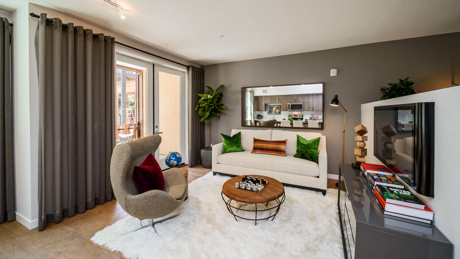 Apartments Sunnyvale-6TenEast-Living Room with Hardwood Style Flooring and Overhead Lighting