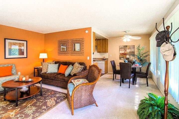 a living room with a couch and a table