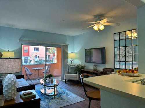 a living room with a couch and a television