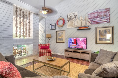 a living room with a couch and a television