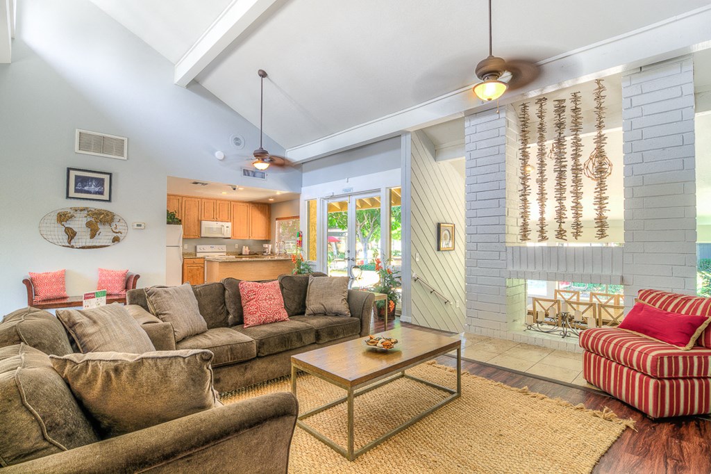a living room with couches and a coffee table