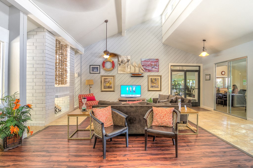a living room with a couch and a tv
