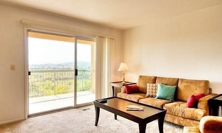 a living room with a couch and a coffee table
