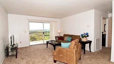 a living room with a couch and a chair