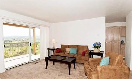 a living room with a couch and a table