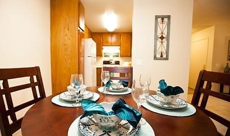 a dining room table with plates on it