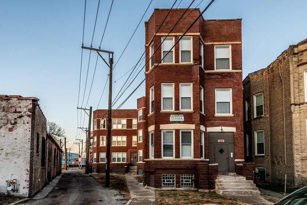 a red brick building on a city street