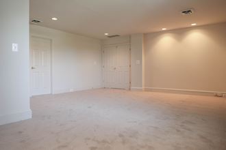 Carpeted Living Area at Ingram Manor Apartments, Pikesville, MD, 21208 - Photo Gallery 3