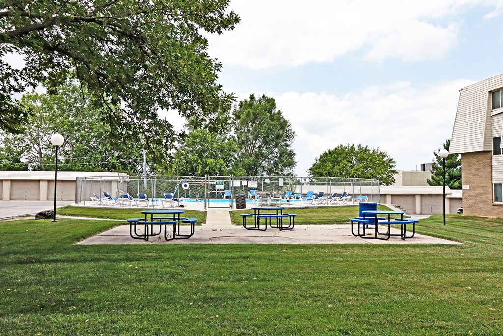 our apartments have a park with picnic tables and a pool