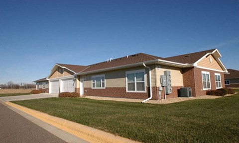 a house on the side of a road