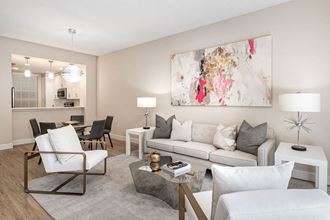 a living room with a couch and a table