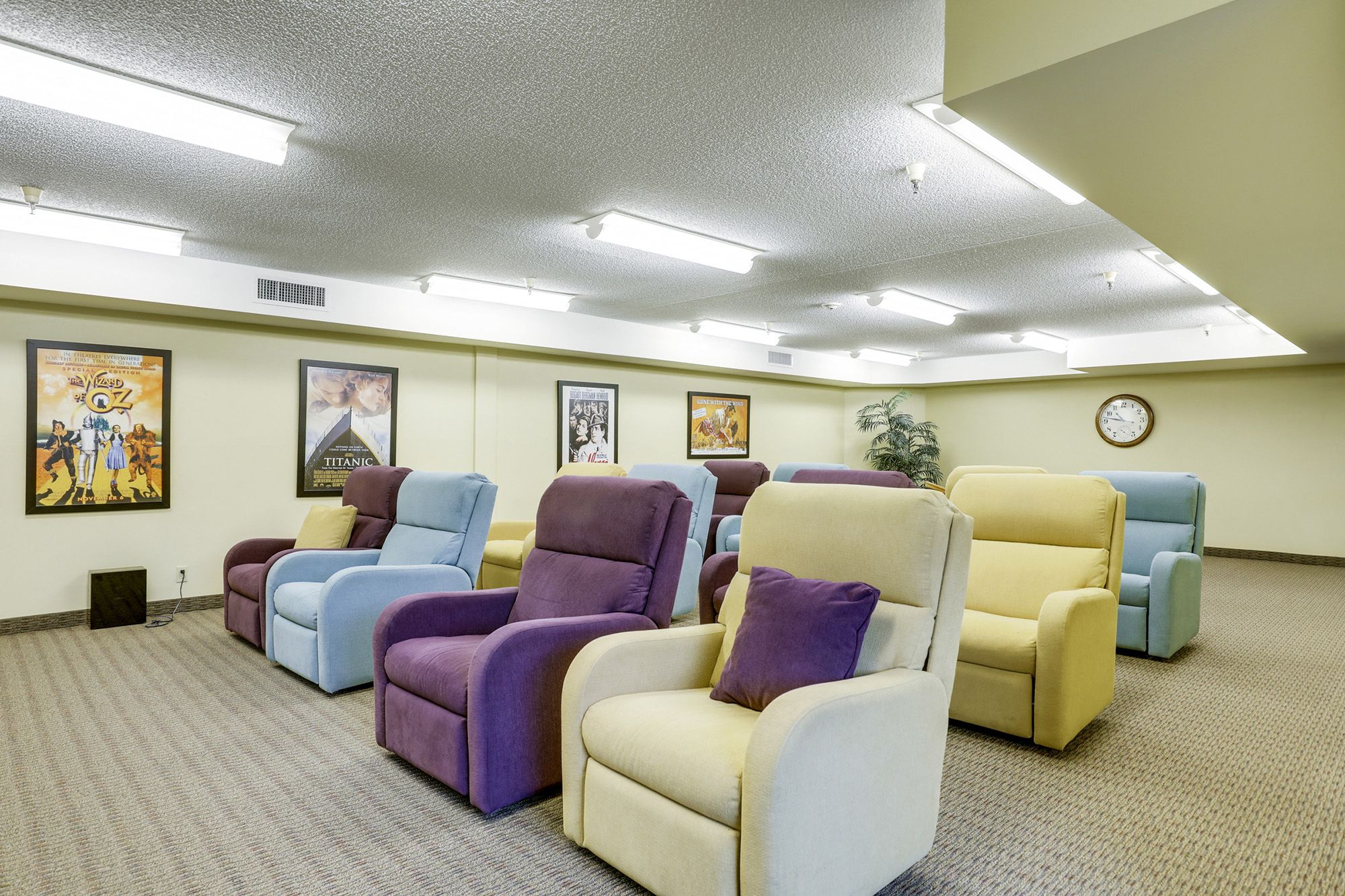 a waiting room filled with different colored chairs