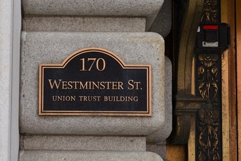 a sign on the side of a building