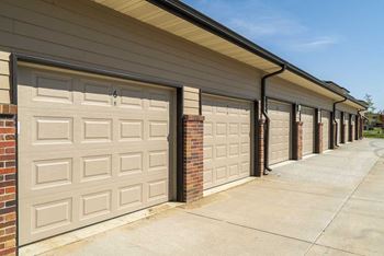 A row of garage doors are closed.