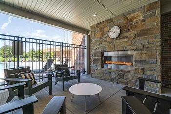 Enjoy our outdoor electric fireplace with seating at The Villas at Mahoney Park in North Lincoln, Nebraska
