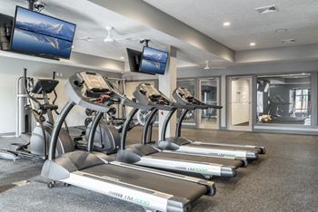 Treadmills and televisions in the 24 hour fitness center at The Villas at Mahoney Park in Northeast Lincoln, Nebraska