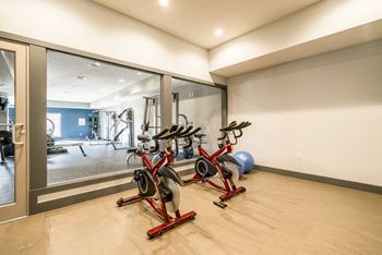Exercise bikes in the yoga studio in the 24 hour fitness center at The Villas at Mahoney Park in Northeast Lincoln, Nebraska