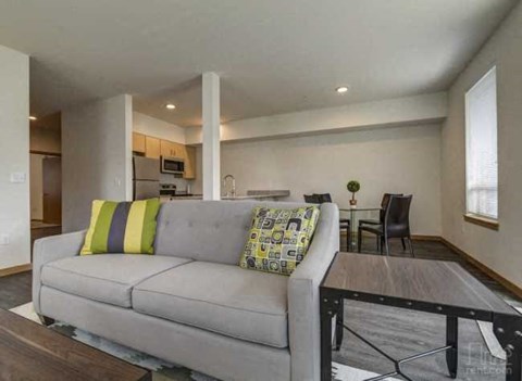 a living room with a couch and a table