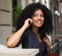 a woman is talking on her cell phone