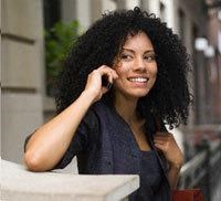 a woman is talking on her cell phone