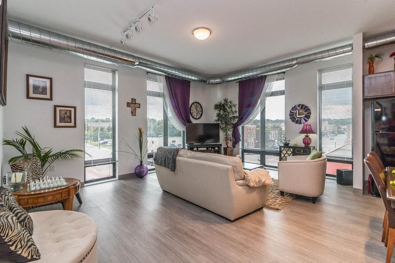a living room with a couch and a tv