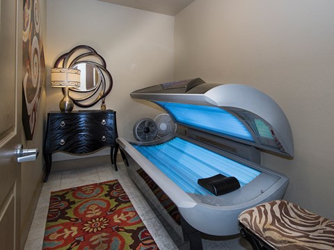 a patient room with a bed and a humidifier