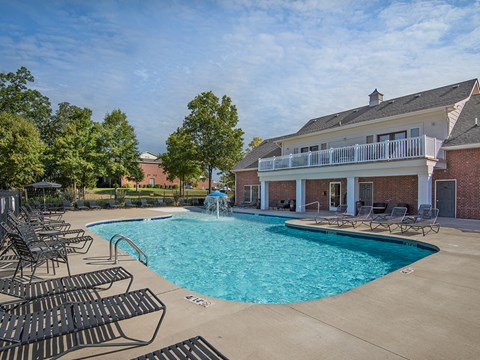 our apartments have a large pool and lounge chairs