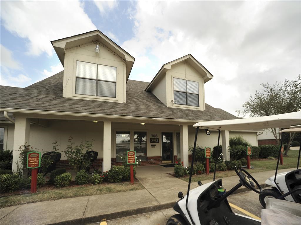 a building with a motorcycle parked in front of it