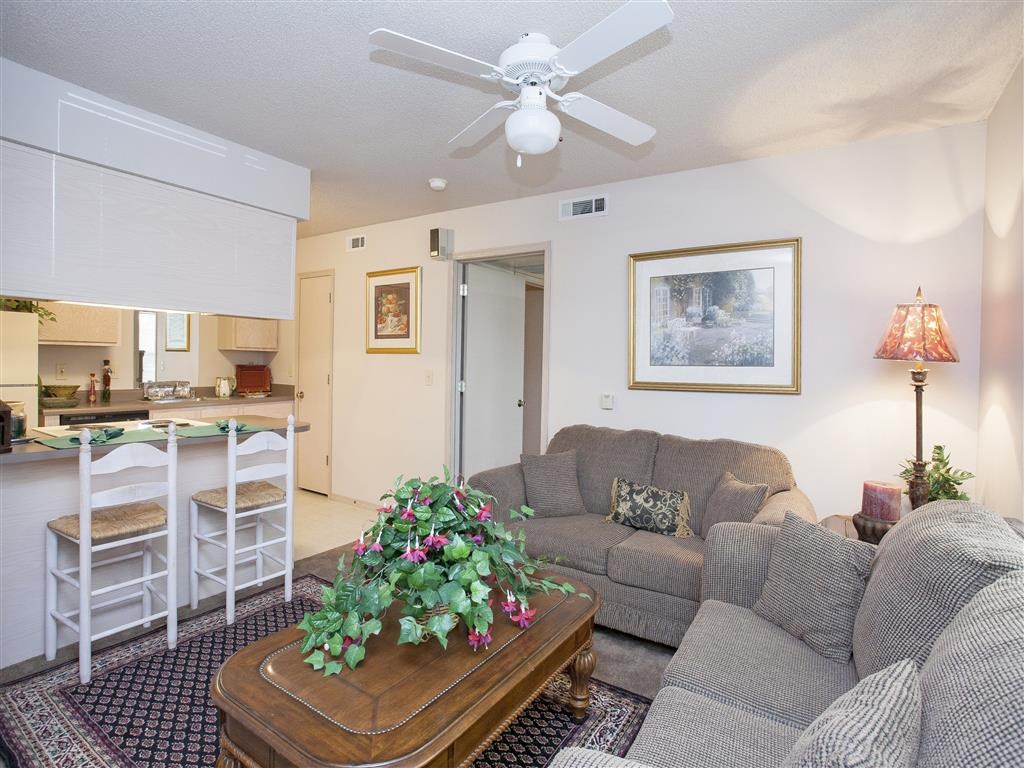 a living room with a couch and a coffee table