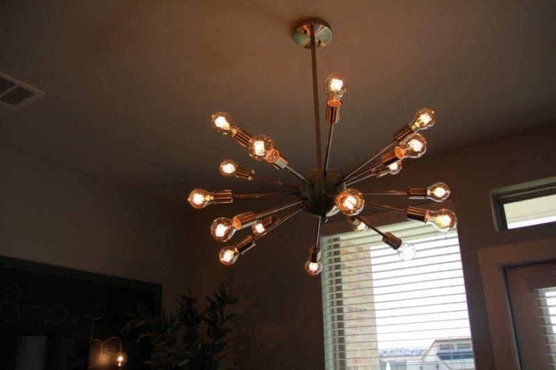 a light fixture hanging from the ceiling of a living room