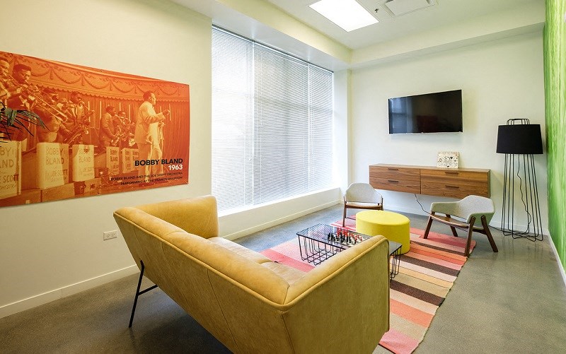 a living room with a couch and a television