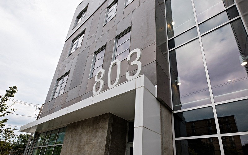 the side of a building with the number 334 on it