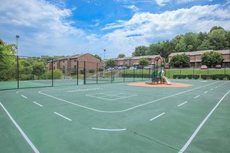 the basketball court at the apartments for rent