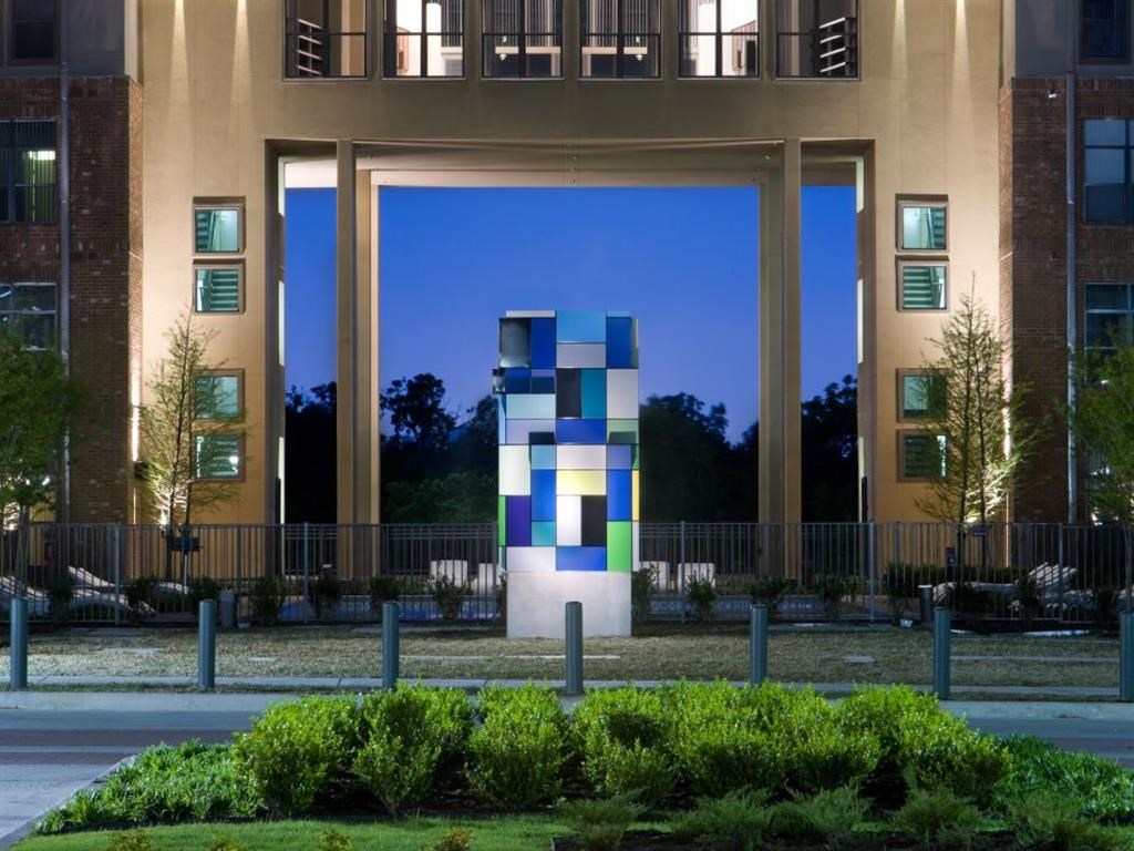 a large sculpture in front of a building