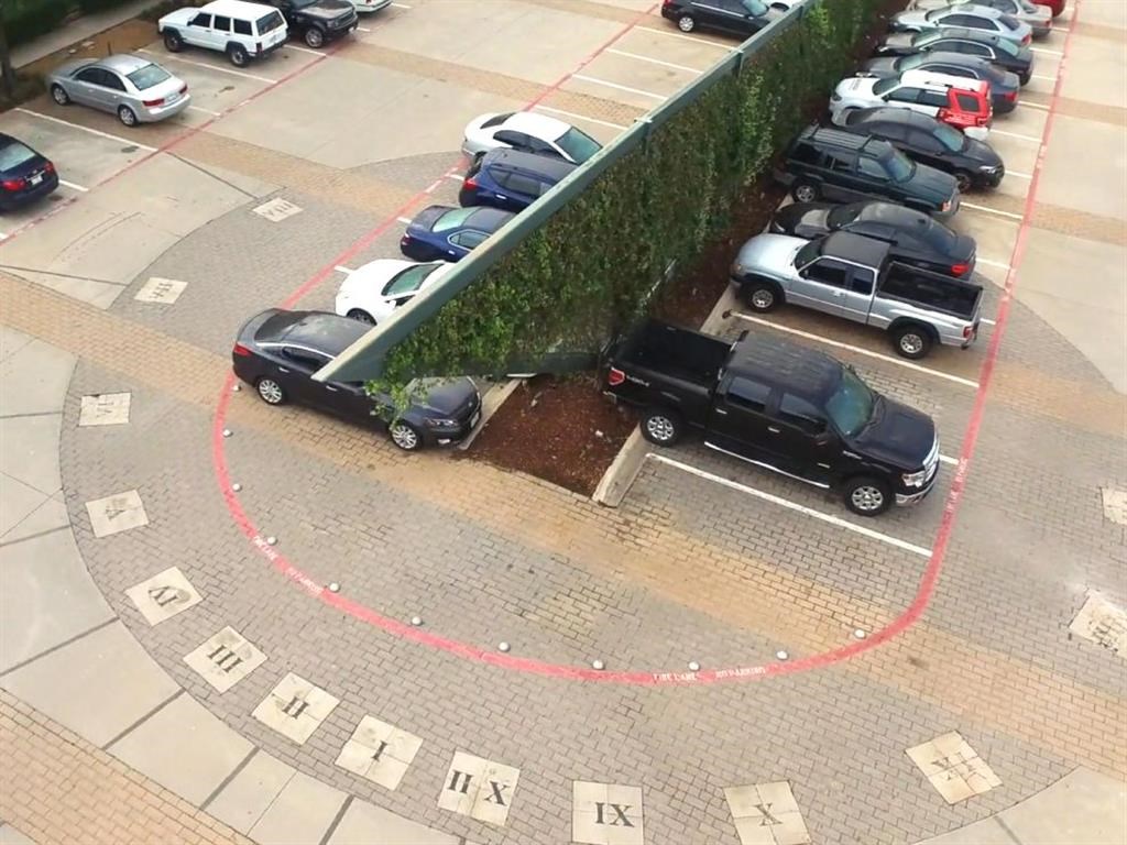 a group of cars parked in a parking lot