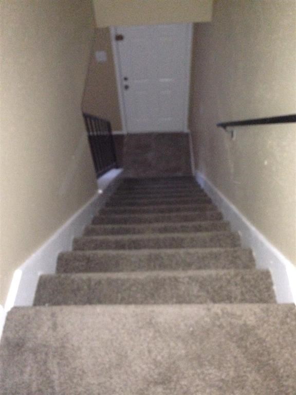 a flight of stairs leading up to a door