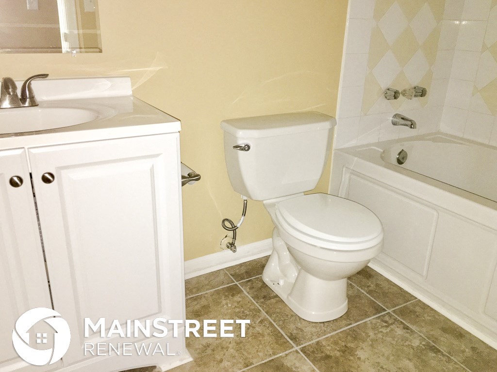 a small bathroom with a toilet and a sink