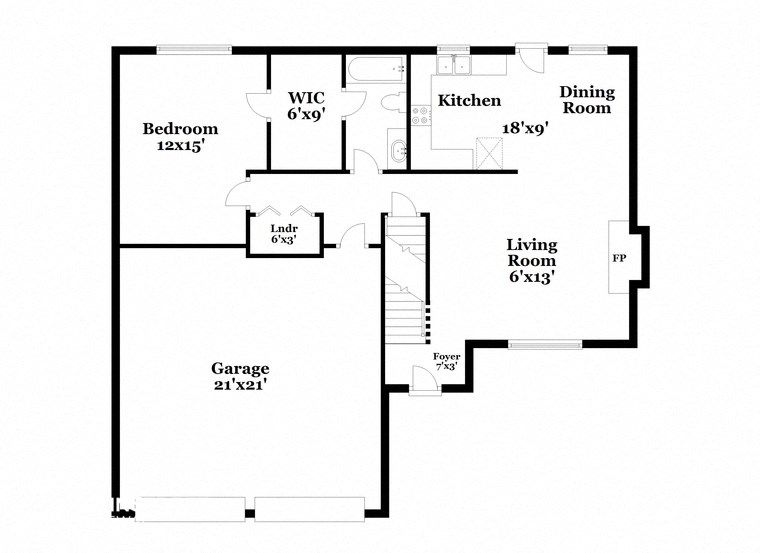 a floor plan of a house with a garage and a living room